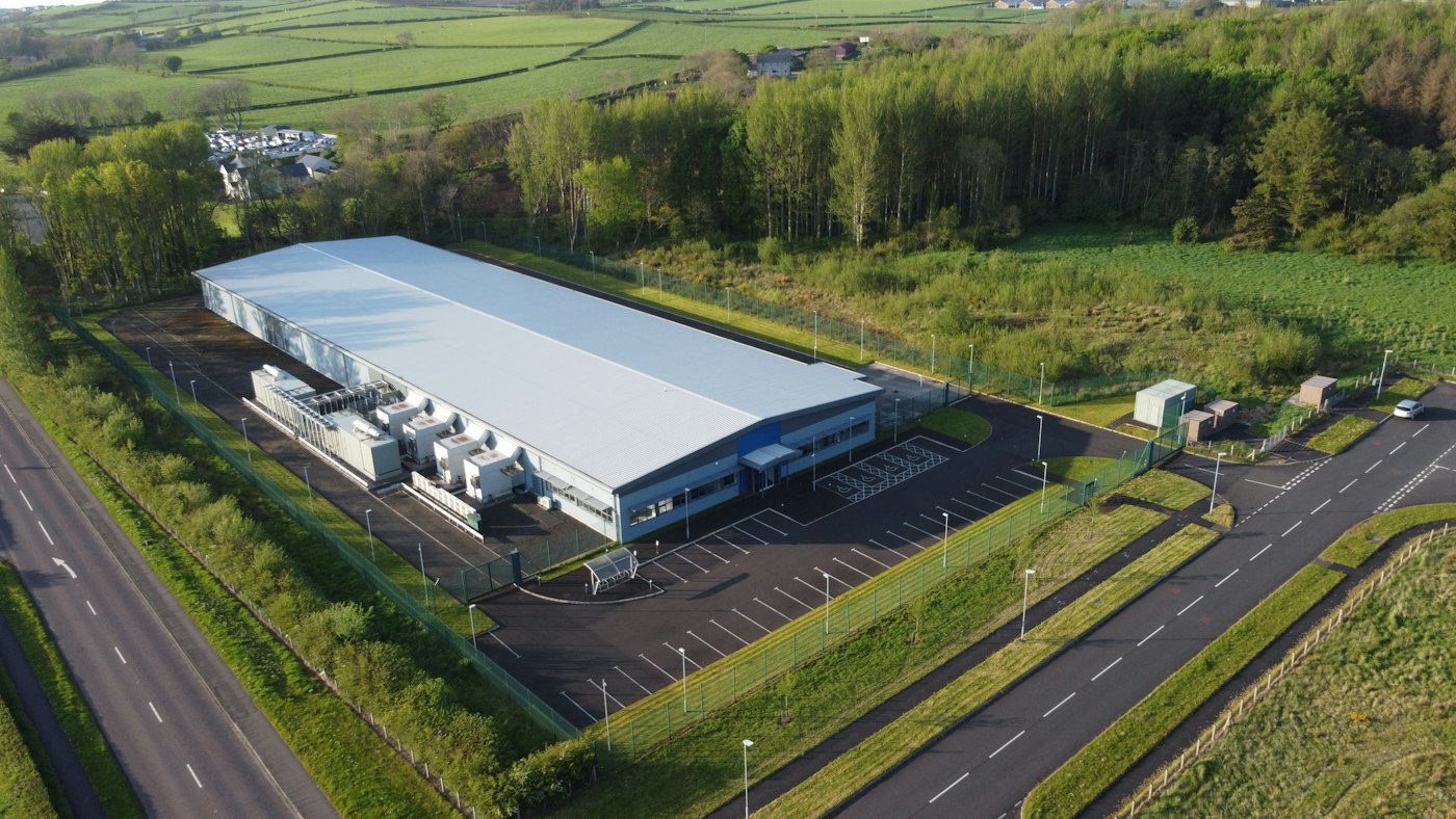 Aerial view of a data centre building and its grounds