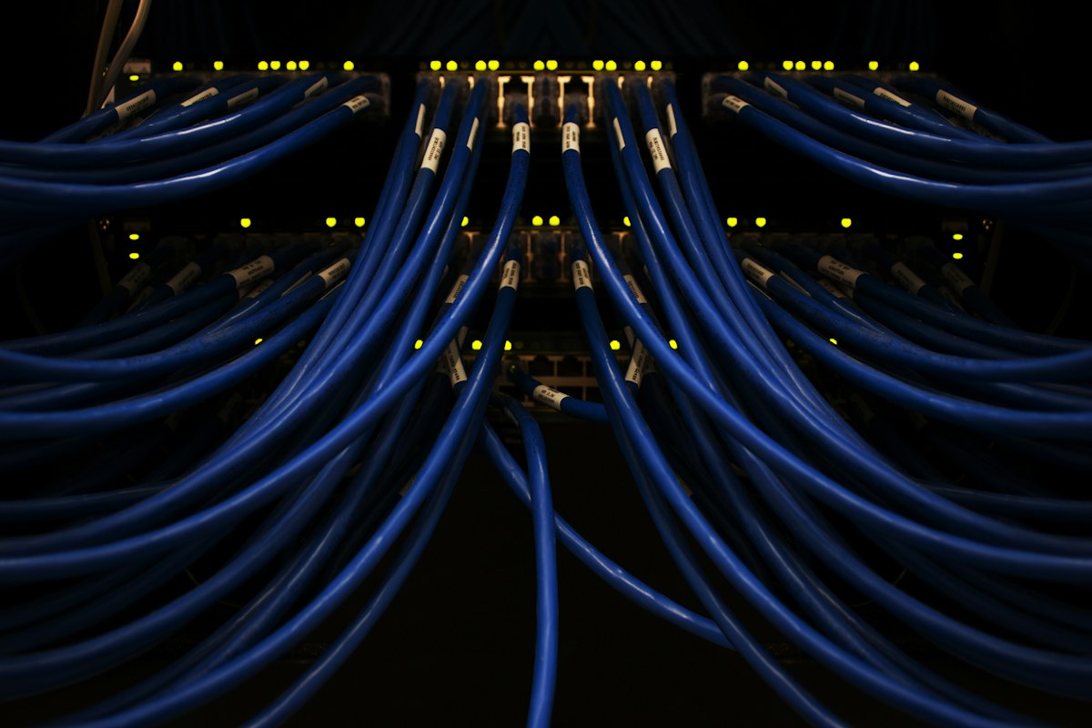 Neatly dressed fibre cables terminating into a switch